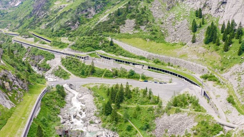 Preview: Switzerland. Picturesque Winding Mountain Road With Tunnels Gotthardstrasse, Aerial View