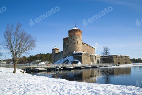 Preview: The Ancient Olavinlinna Fortress In The Winter Landscape. Savonlinna, Finland