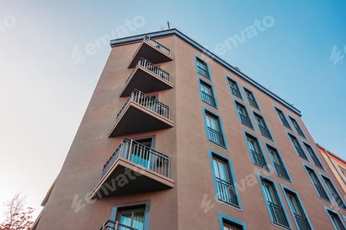 Preview: Orange Corner Building With Triangle Balcony In Low Angle View
