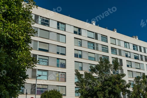 Preview: Typical High Contrasted Office Building With Trees On The Side