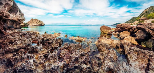Preview: Beautiful Spring Panorama Of Cozy Beach In Northeastern Corinthia, Greece. Sunny Outdoor Scene Of