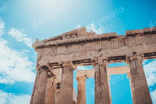 Preview: Low Angle View Of Crumbling Stone Architecture As A Summer Sun Shines Above It