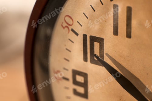 Preview: Closeup Of Hands On Clock Face Clock. Time Concept. Macro Image.