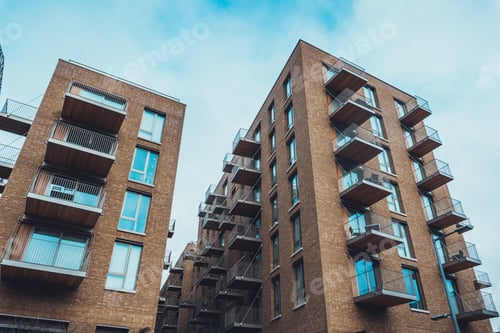 Preview: Extreme Wide Angle View Of Tall Brick Residential Apartment Buildings With Tiny Balconies And Long
