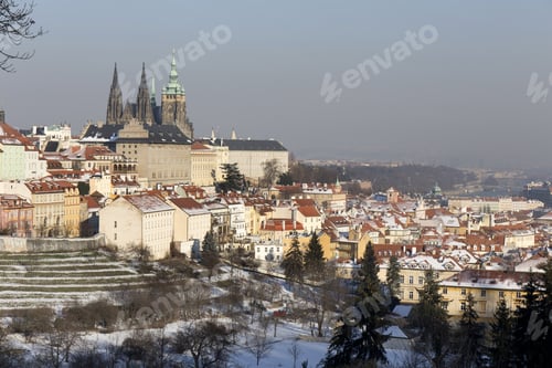 Preview: Snowy Prague City With Gothic Castle In The Sunny Day, Czech Republic
