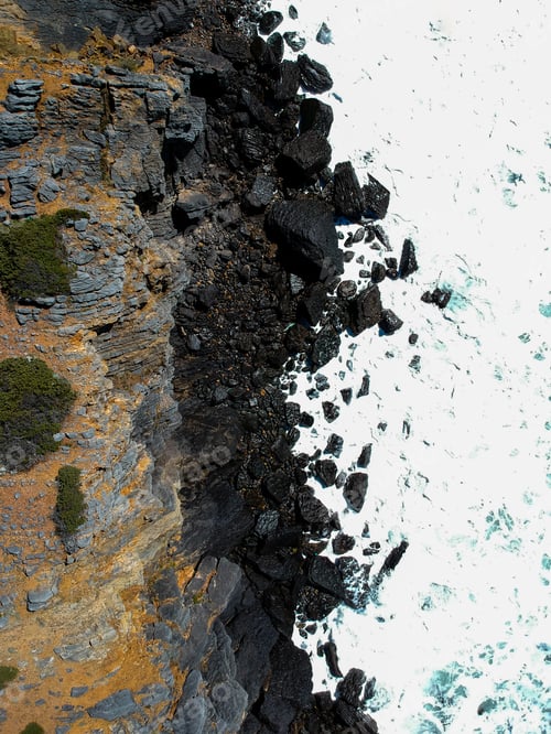Preview: Aerial View Of Sea Waves Crash On The Shoreline. Portuguese Coastline