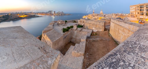Preview: Panoramic Views Of The Medieval City Fortifications And The Bay At Sunset. Valletta. Malta.