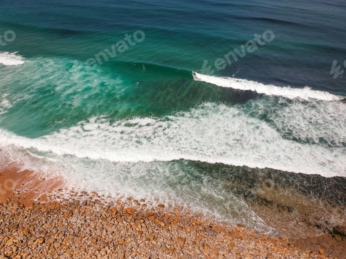 Preview: Aerial View Of Sandy Beach With Rocks And Waves Perfect Spot For Surfing. Drone Photo