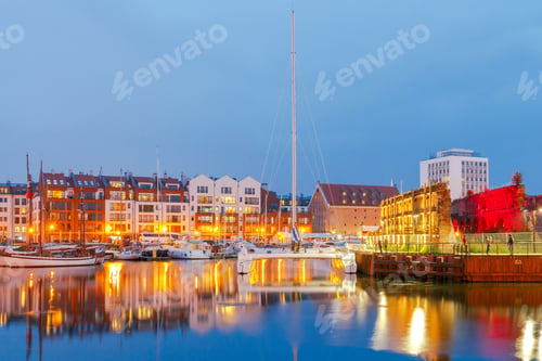 Preview: Multi-Colored Facades And Boat On The Central Waterfront In Gdansk At Night.