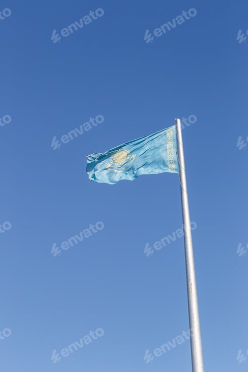 Preview: Republic Of Kazakhstan Flag On The Flagpole. Karaganda, Kazakhstan