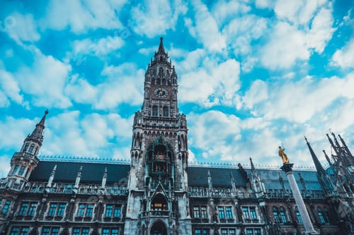 Preview: Low Angle View Of Facade Of New City Hall With Clock Tower And Marian Column Topped By Golden