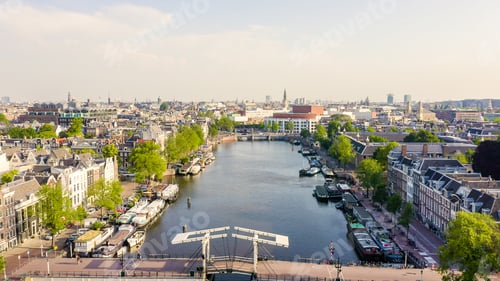 Preview: Amsterdam, Netherlands. Flying Over The City Rooftops. Amstel River, Amstel Gateways, Aerial View