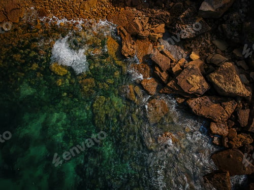 Preview: Aerial View Of Waves, Rocks And Transparent Sea. Summer Seascape. Top View From Drone. Rocky