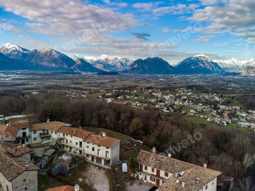 Preview: Panoramic From Above On The Ancient Village Of San Lorenzo Di Buja And On The Snow-Capped Mountains.