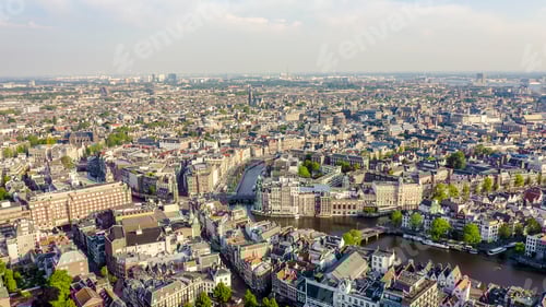 Preview: Amsterdam, Netherlands. Flying Over The City Rooftops. The Historical Part Of The City With Urban