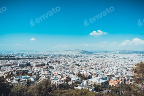 Preview: Aerial View Over The Rooftops Of Athens, Greece, Looking Towards Distant Hills Showing The