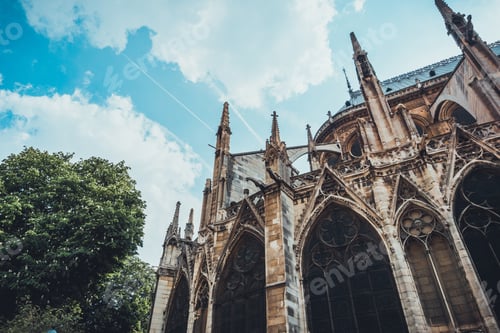 Preview: Historic Gothic Styled Church With Tracery Windows And Buttresses As Seen From A Low Angle View