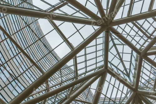 Preview: Interior View Looking Up At Glass Ceiling Of Modern Commercial Building With Architectural Supports