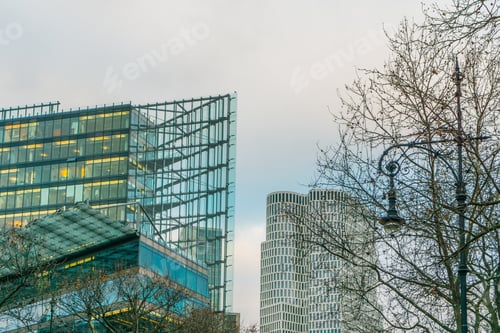 Preview: Glass Buildings In The Afternoon With Tree On The Right Side