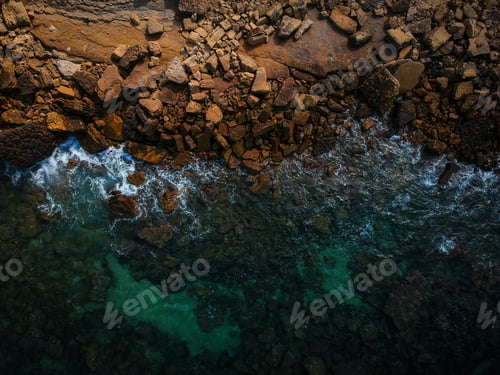 Preview: Aerial View Of Waves, Rocks And Transparent Sea. Summer Seascape. Top View From Drone. Rocky