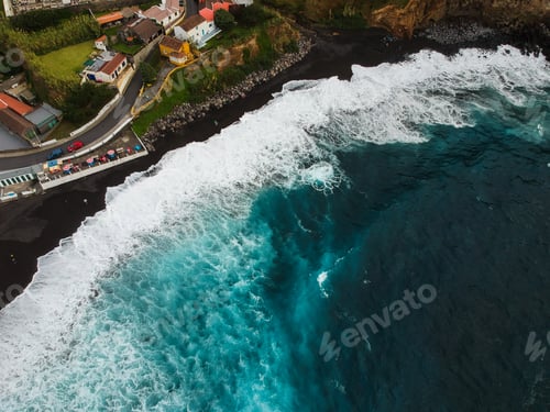 Preview: Aerial Top View Of Sea Waves Hitting A Beach With Black Volcanic Sand With Turquoise Sea Water
