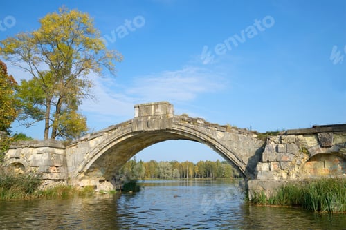 Preview: The Remains Of The Old Humpback Bridge On White Lake. September In Gatchina Park, Russia