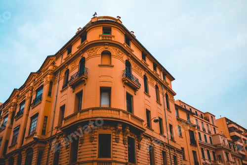 Preview: Orange And Darken Colored Building From The Corner View
