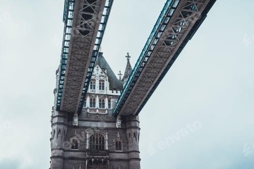 Preview: Architectural Detail Of The Tower Bridge, London Looking Up Towards The Stone Facade Of One Of The