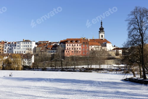 Preview: Colorful Royal Snowy Medieval Town Pisek Above The Frozen River Otava, Czech Republic