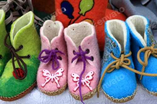 Preview: Details Of Felt Shoes On The Counter