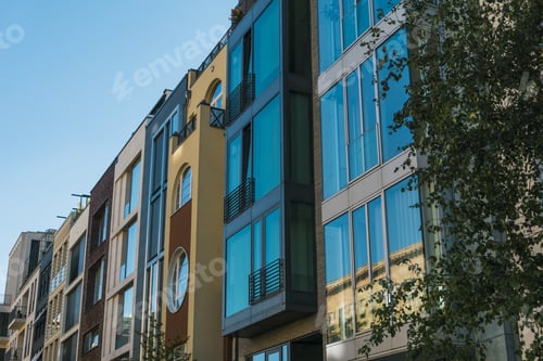 Preview: Townhouses With Big Blue Windows In A Row