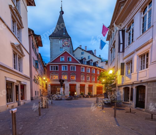 Preview: View Of The Old Narrow Medieval City Street With Burning Lanterns. Zurich. Switzerland.