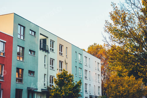 Preview: Red, Green And Yellow Townhouses In A Row At Autumn