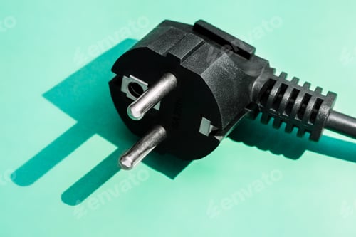 Preview: Electric Plug On Green Background With Shadow