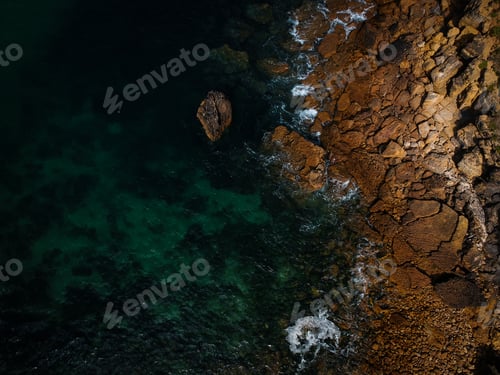 Preview: Aerial View Of Waves, Rocks And Transparent Sea. Summer Seascape. Top View From Drone. Rocky