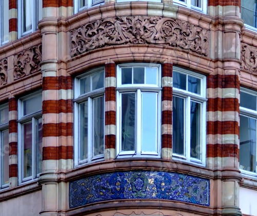 Preview: View To A Window On The Corner Of A Building With Mosaic Beneath