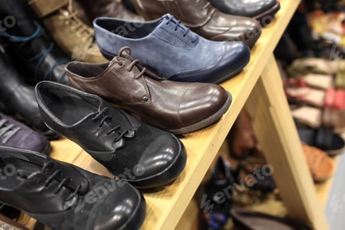 Preview: Mens Shoes On The Wooden Shelves At A Store