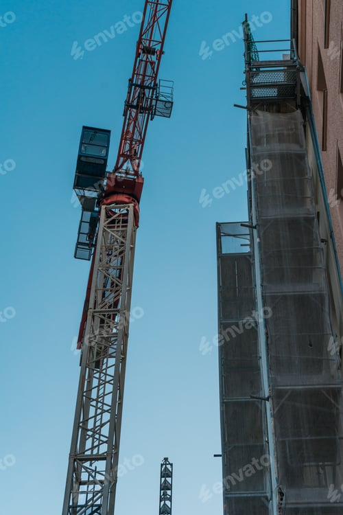 Preview: Crane At Construction Side With Scaffolding