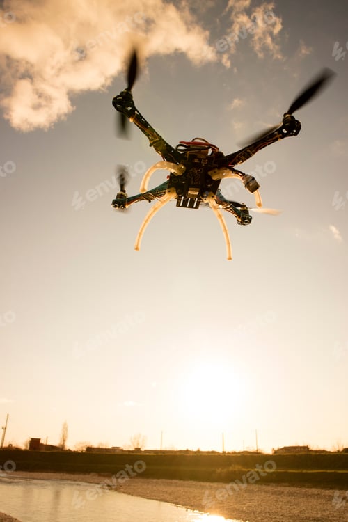 Preview: Photographic Representation Of The Flight Of A Drone At Sunset