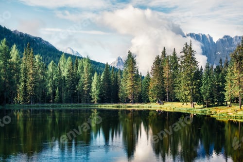 Preview: Foggy Morning View Of Antorno Lake With Cristallo Mountain Range On Background. Picturesque Autumn
