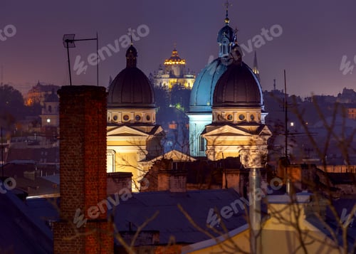 Preview: Aerial View Of The City Rooftops And Church Domes At Night. Lviv. Ukraine.