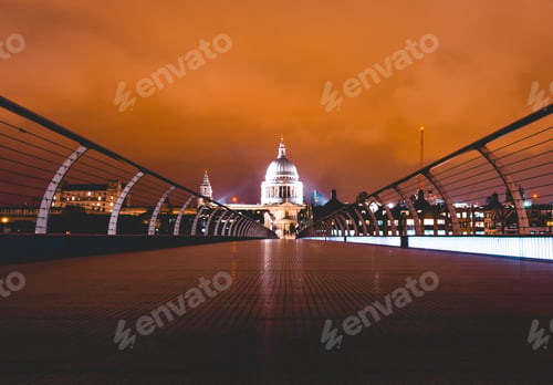Preview: Low Angle View Of Modern Millennium Bridge In London With St Pauls Church In The Middle