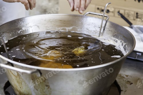 Preview: Frying Pan Filled With Frying Oil, Food And Desserts