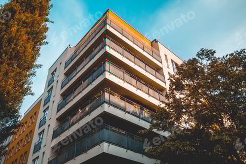 Preview: Corner Building With Steel Balcony Framed By Trees