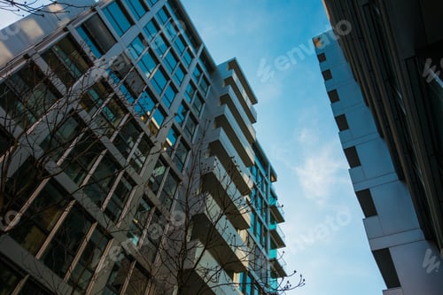 Preview: Street With Finance Buildings In Low Angle View And Darken Shadows