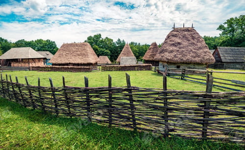 Preview: Stunning Summer View Of Traditional Romanian Peasant Houses. Bright Rural Scene Of Transylvania