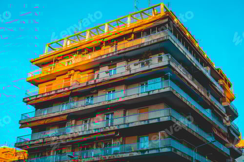 Preview: Big Apartment Complex In Square Form In The Warm Afternoon Sunlight