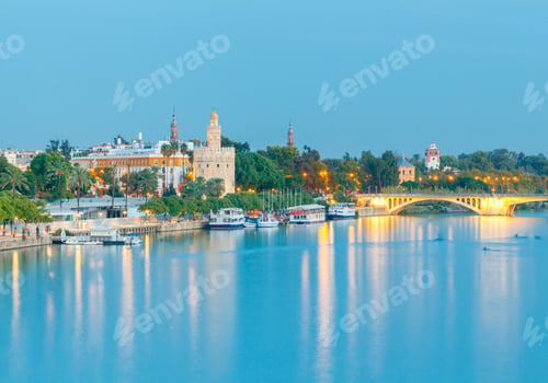 Preview: Night View Of The Golden Tower On The Waterfront Of The Guadalquivir. Sevilla. Andalusia.