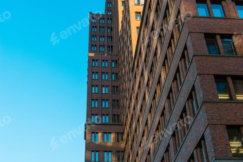 Preview: Red Brick Finance Building With Clear Sky In The Background