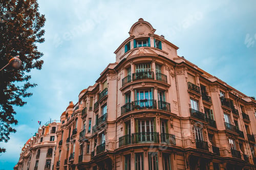 Preview: Beautiful Real Estate Corner Building At Nice, France With Darken Blue Sky In The Background